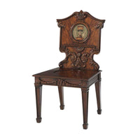 The Wootton Hall Accent Chair with mahogany wood, painted/inlaid medallion, and fixed armless frame.