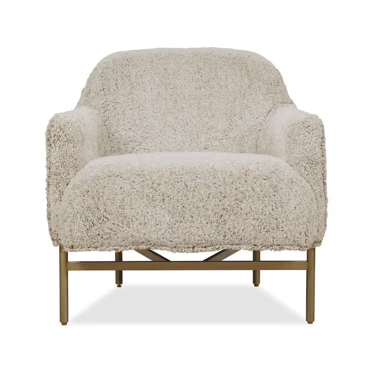 Milo Lounge Chair, shown in ivory and cream with shearling-look fabric, bouclé textile, and fixed upholstered arms.