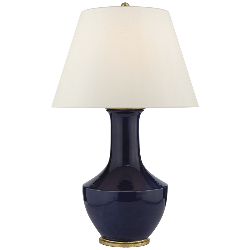 Laila Table Lamp, shown in navy blue and celadon with ceramic, linen, and a tapered drum shade.