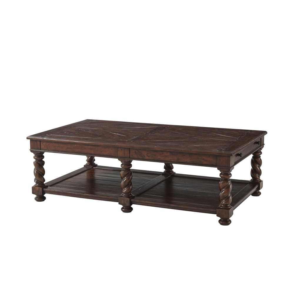 The Great Hall Cocktail Table, shown in dark brown and espresso with wood, metal accents, and integrated lower storage shelf.