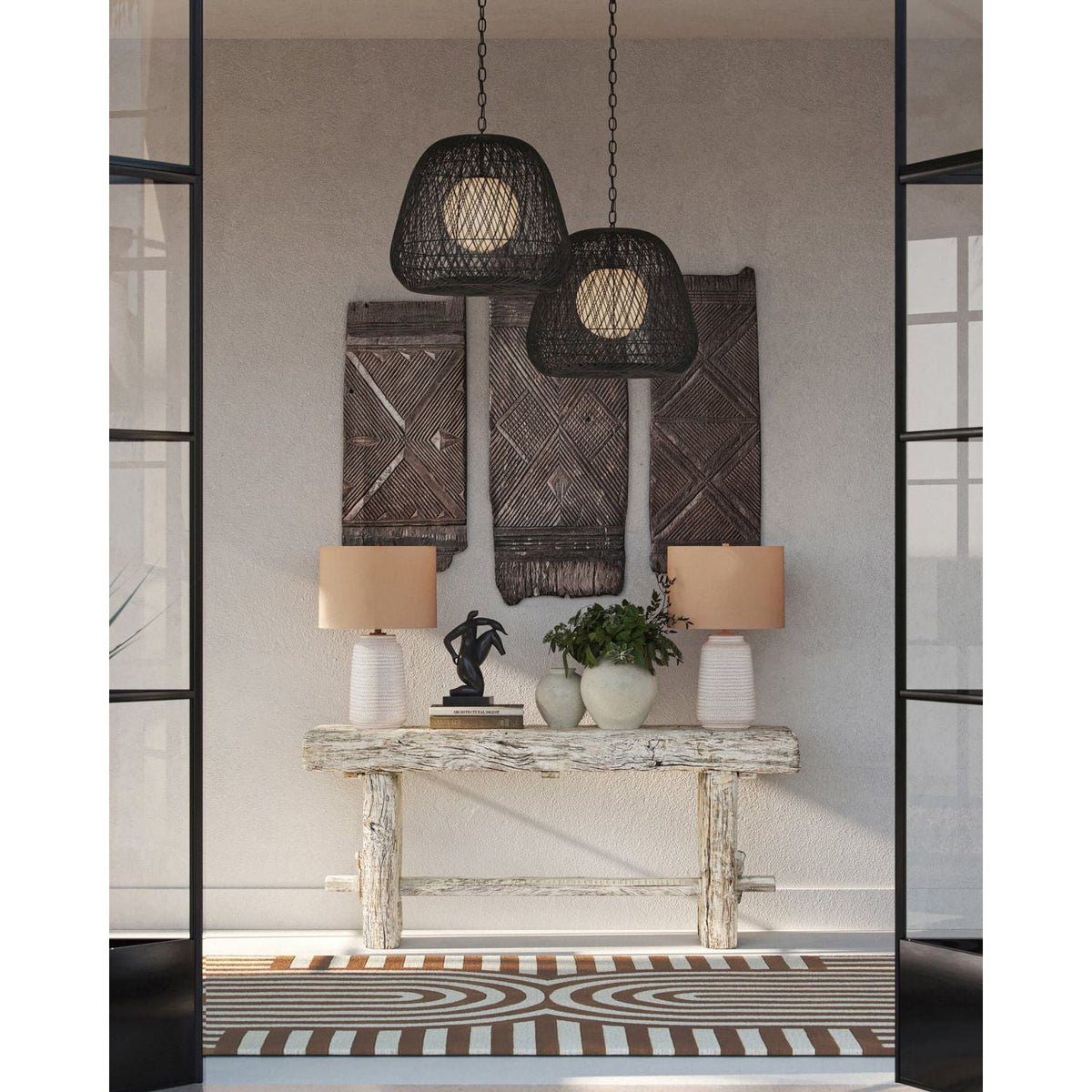 Alternate view of Osbert Black Pendant, featuring matte woven finish, paper twine, metal, and chain suspension.