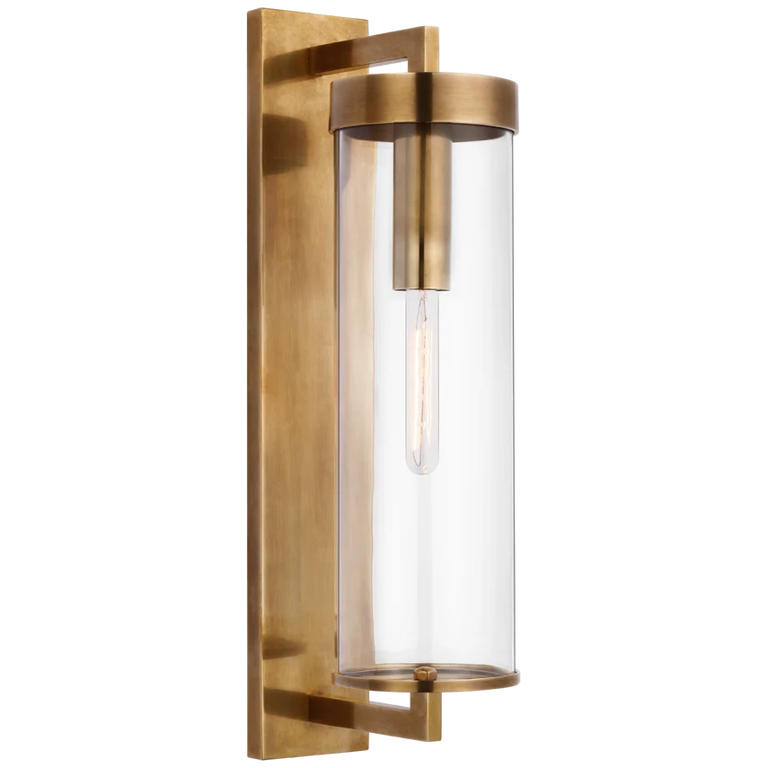 Connection Large Bracketed Outdoor Wall Sconce, shown in antique brass and clear with brass and glass.