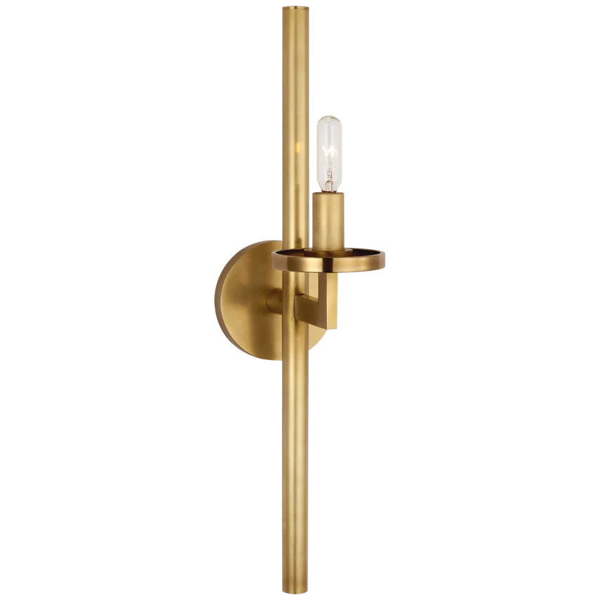 Connection Lone Sconce, shown in antique brass and warm gold with brass, metal, and a circular wall-mounting backplate.