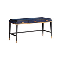 Kallista Large Blue Desk, shown in deep sapphire blue and navy blue with wood veneer, brass, and three flush drawers.