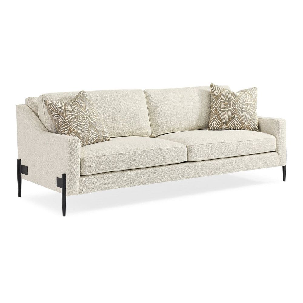 Mashup 85" Sofa, shown in ivory and cream with fabric, metal, and fixed arms.