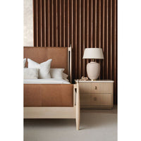 Additional view of Tempo Bed, featuring brushed bronze finish, wood, leather, and fixed upholstered headboard.