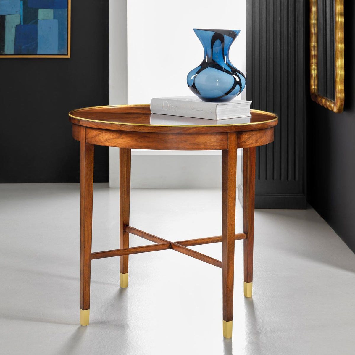 Modern History Large Cavalli End Table with a round brown top and gold leaf accents