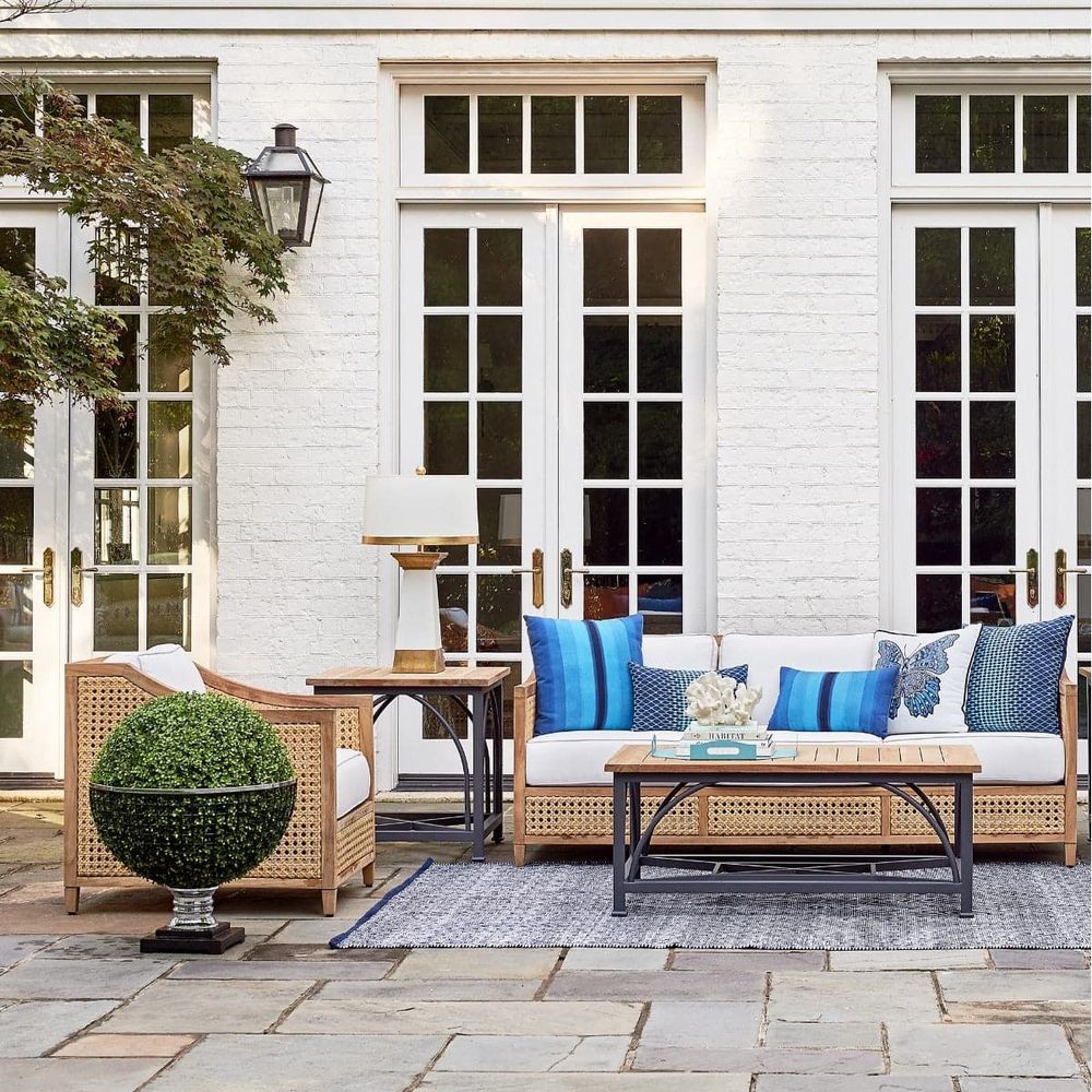 Alternate view of Jupiter Sofa, featuring woven finish, teak, synthetic cane webbing, and fixed flared arms.