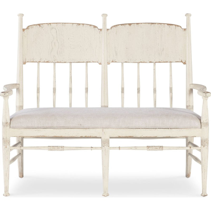 Americana Dining Bench, shown in ivory white and cream with wood, fabric, and fixed arms.