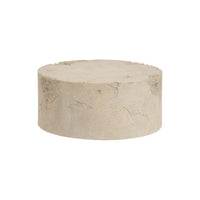 Epoch Coffee Table, shown in beige and off-white with stone, cast stone, and a solid monolithic drum base.