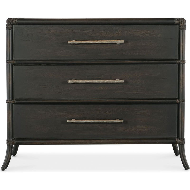 Retreat Pole Rattan Chest, shown in dark brown and espresso with wood, rattan, and three full-width drawers.