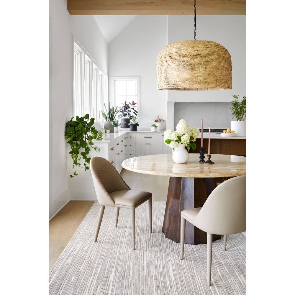 Alternate view of Linus Dining Table, featuring honed stone finish, travertine, solid wood, and a central pedestal base.