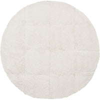 Alternate view of Barefoot Ottoman in white and ivory with low round drum ottoman with tufted top.