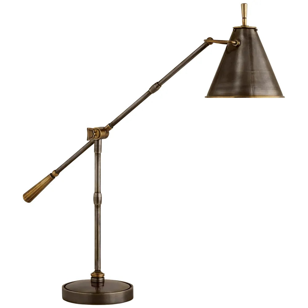 Greatman Table Lamp, shown in dark bronze and antique brass with metal and articulated adjustable arm.