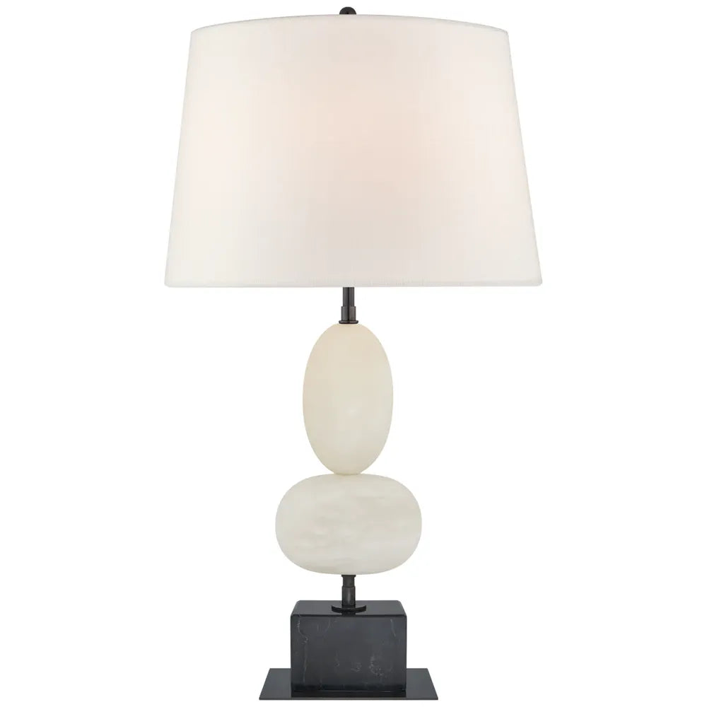 Dany Medium Table Lamp, shown in ivory and cream with alabaster, fabric, and a fabric drum shade.