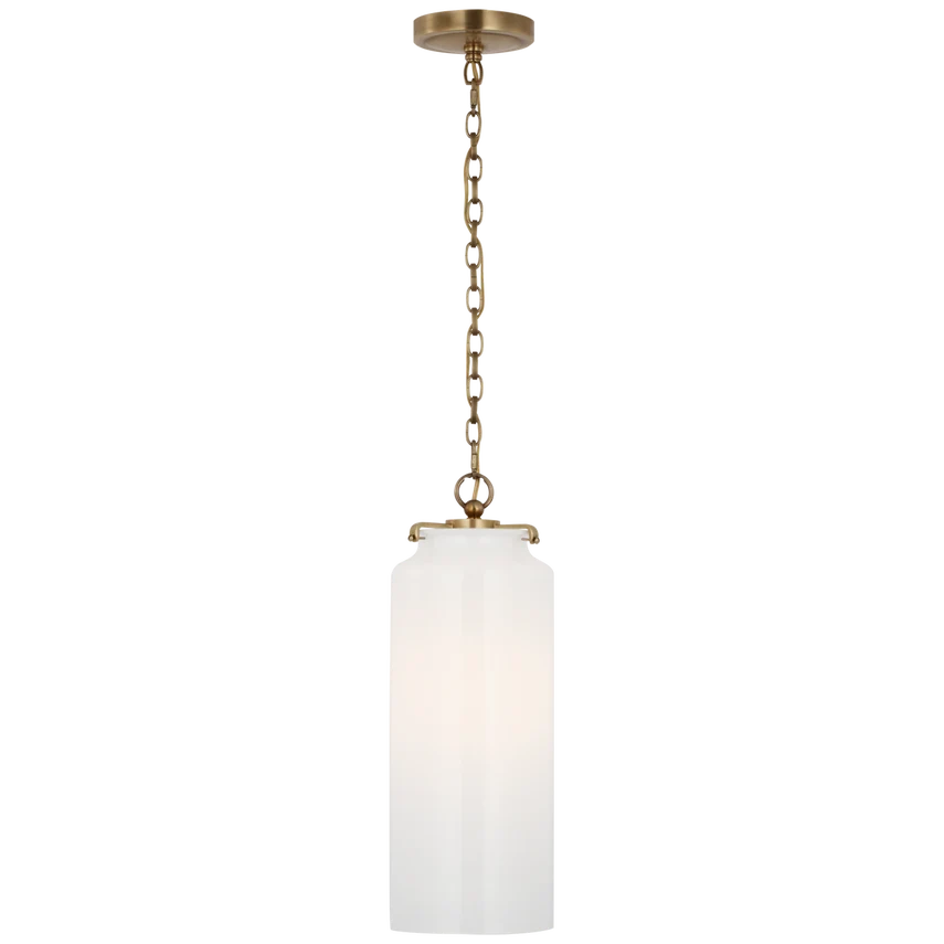 Ava Large Cylinder Pendant, shown in antique brass and frosted white with brass, glass, and chain-hung suspension.