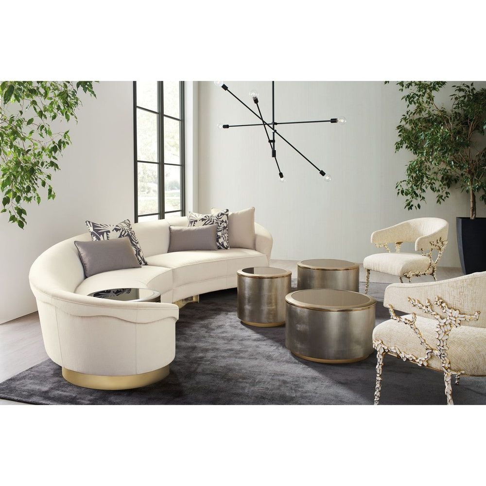 Alternate view of Orbit Bunching Accent Table in champagne and brushed gold with low cylindrical drum.