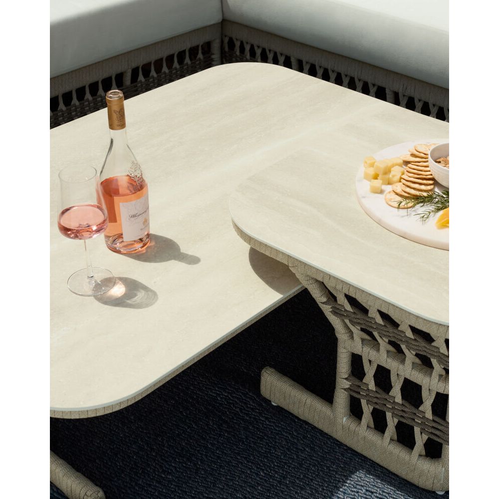 Alternate view of Winder Coffee Table, featuring matte finish, woven rope, synthetic wicker, and broad flat tabletop.